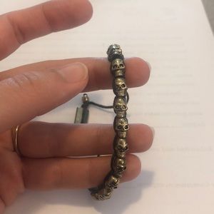 Black and gold skull necklace
